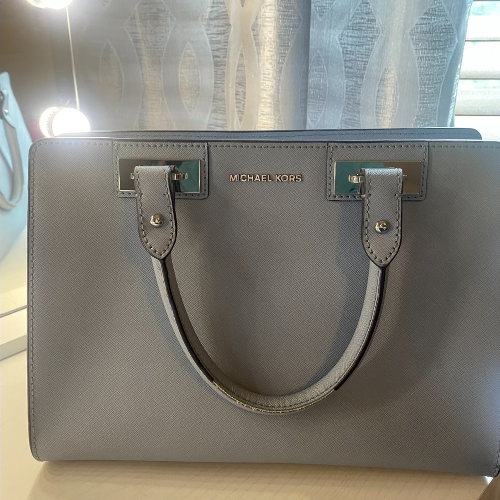 Michael Kor Blue handbag.